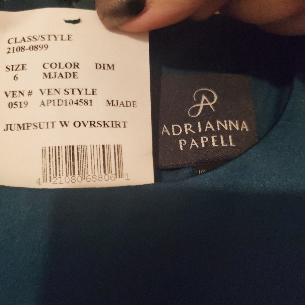 Jade formal jumpsuit with overskirt/train. This is an Adrianna Papell, size 6.